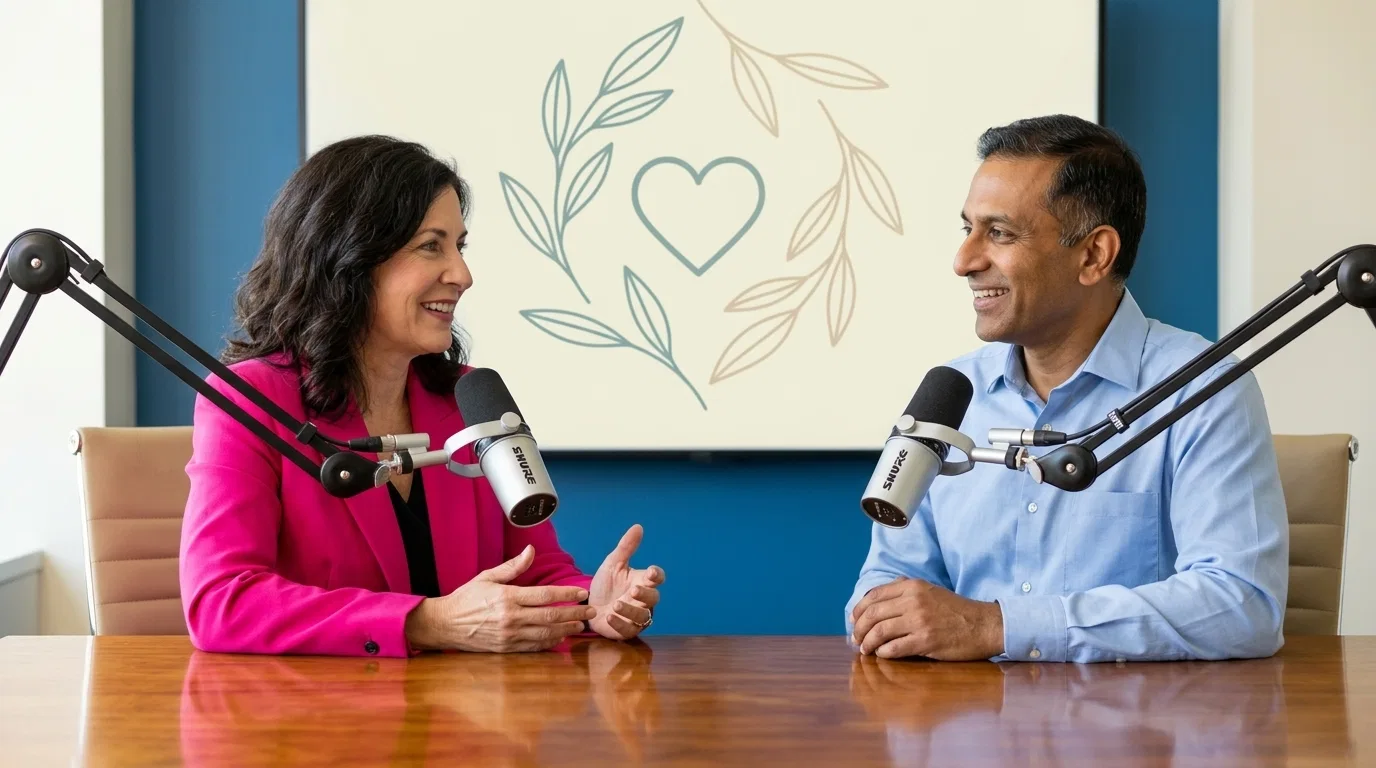 Two editors in conversation at a studio table discussing natural ingredients for vascular support